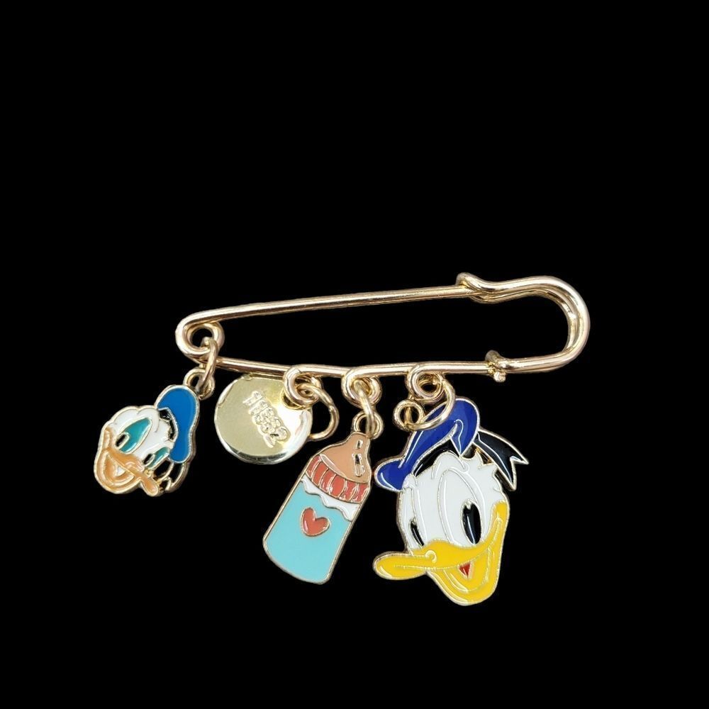 2/$20 Brand New Disney Donald Duck Gold Pin With Charms